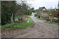 Junction of track and minor road at NE end of Radford