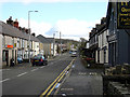 SH5271 : The A5 Holyhead Road running through Llanfairpwll by John Lucas