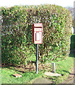TA1377 : Elizabeth II postbox on Gap Road, Hunmanby Gap by JThomas