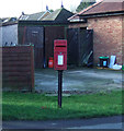 TA1077 : Elizabeth II postbox on Outgaits Lane, Hunmanby by JThomas
