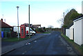 TA1077 : Postbox and telephone box on Outgaits Lane, Hunmanby by JThomas