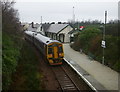 NG7932 : Train in the rain, at Plockton Station by Craig Wallace
