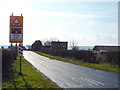 Approaching the level crossing on Carr Lane