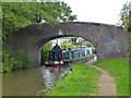 Narrowboat passing under Clay Pits Bridge No 39