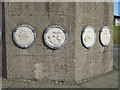 Plaques round the base of "Shadows in another light"