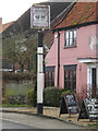 The Fighting Cocks Public House sign