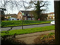 Footpath arrives at Harwood Road