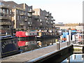 Narrowboats at Brentford Lock include Maharlika and Ginger Bear