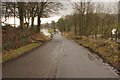 Minor road leading down to the A811