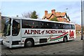 SH7877 : School bus outside the Tourist Information Centre in Conwy by Richard Hoare