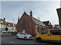 Parked vehicles outside Cross Ways Church