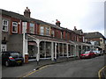 Shops with verandah on Acacia Grove, West Kirby