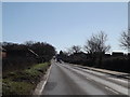 TG2503 : Entering Framingham Earl on the B1332 Bungay Road by Geographer