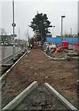 TL4657 : Devonshire Road: work on the new cycle path by John Sutton