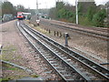 A district line train approaches Upminster Bridge station