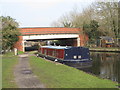 TQ0488 : Canal boat moored by Bridge 180, Grand Union Canal by David Hawgood
