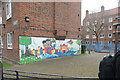 View of wall art in the play area on the corner of Greatorex and Hanbury Streets