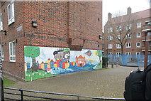 TQ3481 : View of wall art in the play area on the corner of Greatorex and Hanbury Streets by Robert Lamb