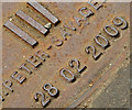 Manhole cover casting date inscription, Belfast (March 2016)