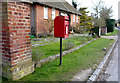 Elizabeth II postbox outside Hexton Village Hall