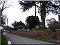 Post box by St.James at Kington