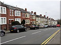 Parked cars and a long row of Risca Road houses, Newport