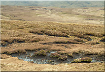 NN1722 : Peat haggs below Coire an Stacain by Trevor Littlewood