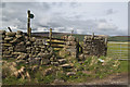 Two stiles and footpaths off Stump Hall Lane