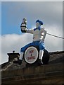 "Boy and Barrel" rooftop sign in Huddersfield