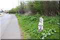 Milestone in verge of Derby Road (A6)