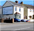 JCDecaux advertising site on a Heol-y-bwlch house side wall, Bynea