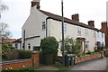 Houses on Loughborough Road with rebuilt brick walls