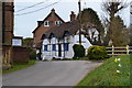 Thatched cottage opposite the village hall at Upper Farringdon