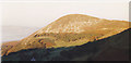 A sunlit Foel Lus above Penmaenmawr