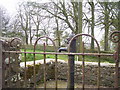 Wiston - old village pump in centre of road junction