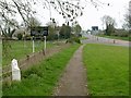 Road junction at Morcott with milepost