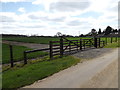 TM1257 : Field entrance off the entrance to Home Farm by Geographer