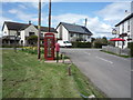 SK2637 : Elizabeth II postbox and telephone box, Lees by JThomas