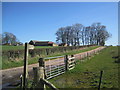 Farm Buildings, Mile Moor Farm and Footpath Sign