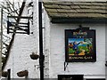 Inn signs at the Hanging Gate