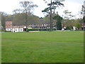 Cottesmore Hotel and Golf Club seen from footpath across golf course