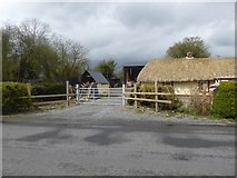 N4406 : Thatched cottage and farmyard near Owenass Bridge by Oliver Dixon