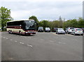 Tourist coach in Milestone Ground Car Park, Broadway