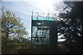 View of the climbing wall on Mill Rythe Holiday Village in scaffolding from the coastal path