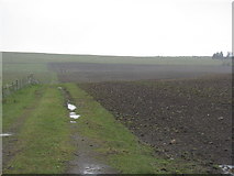 NT2452 : Newly ploughed field near Nether Falla by M J Richardson