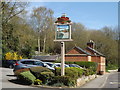 TL2212 : The Long Arm Short Arm Public House sign by Geographer