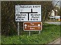 TM1853 : Roadsigns on the B1077 Ashbocking Road by Geographer