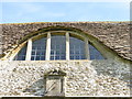 Inscription above south front lunette, Monk