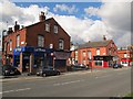 SE2732 : Corner shops, Armley by Stephen Craven