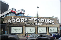 TQ3382 : View of "Let's Adore and Endure Each Other" street art on the Broad Street Viaduct from Great Eastern Street by Robert Lamb